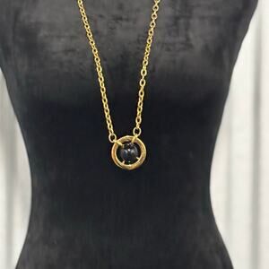 Monet Vintage Gold Tone Pendant Necklace with Black Lucite Orb 1970s Mod Jewelry